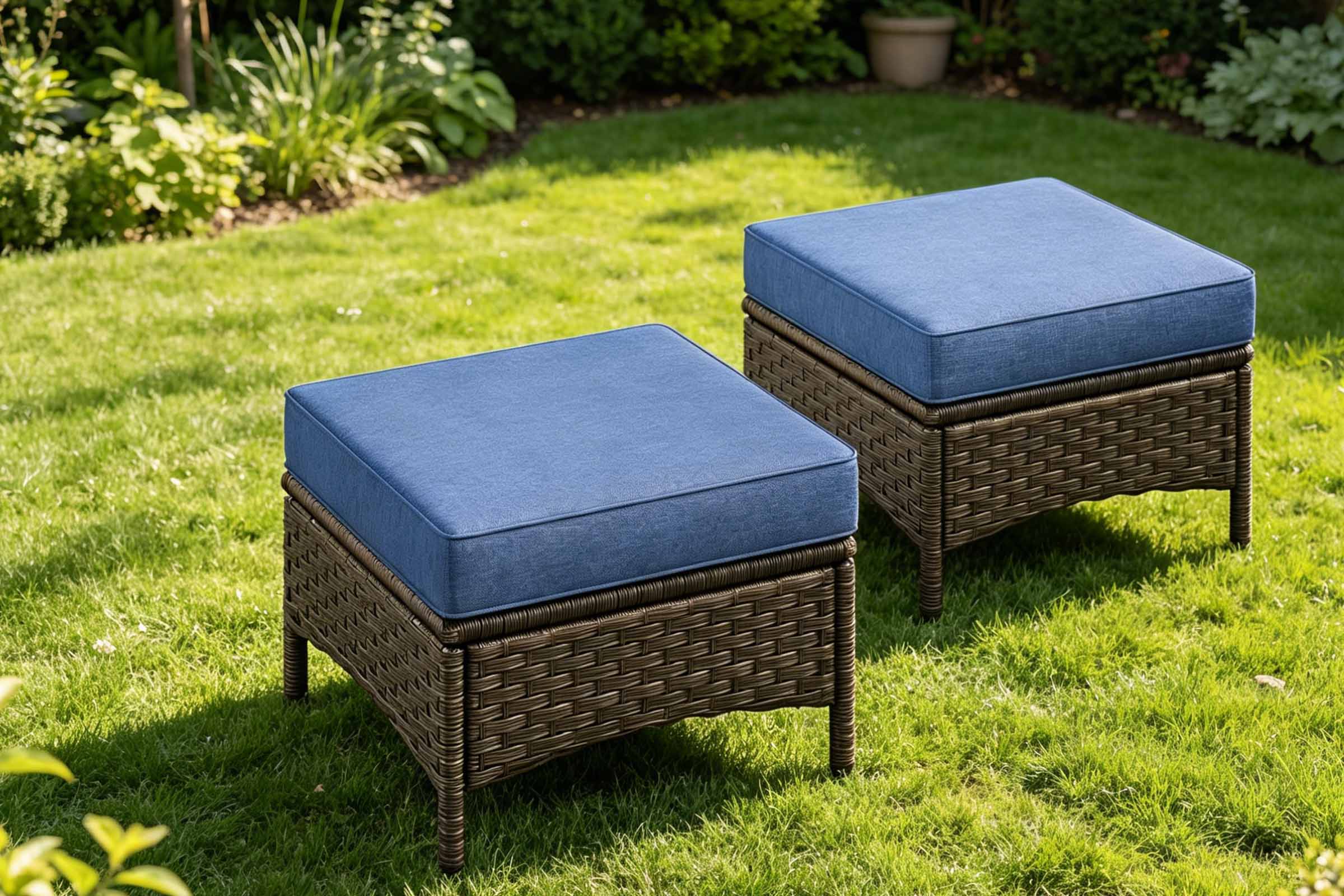 2-Piece_Outdoor_Patio_Wicker_Ottomans_with_Gray_Cushions on the grass.#color_navy