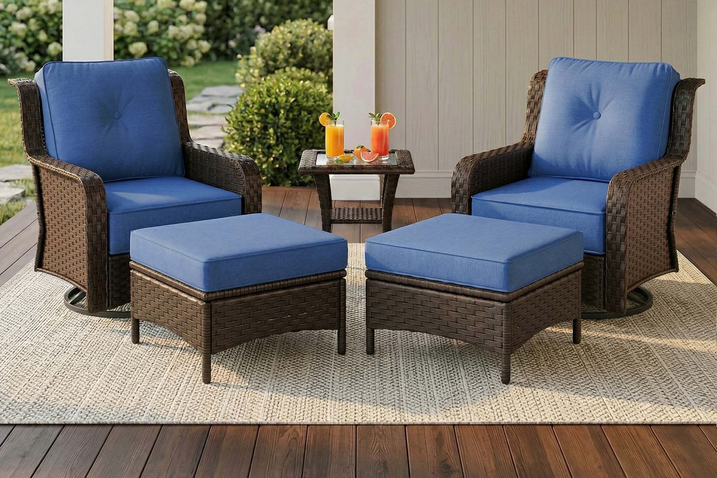 2-Piece_Outdoor_Patio_Wicker_Ottomans_with_Navy Blue_Cushions on the patio.#color_navy