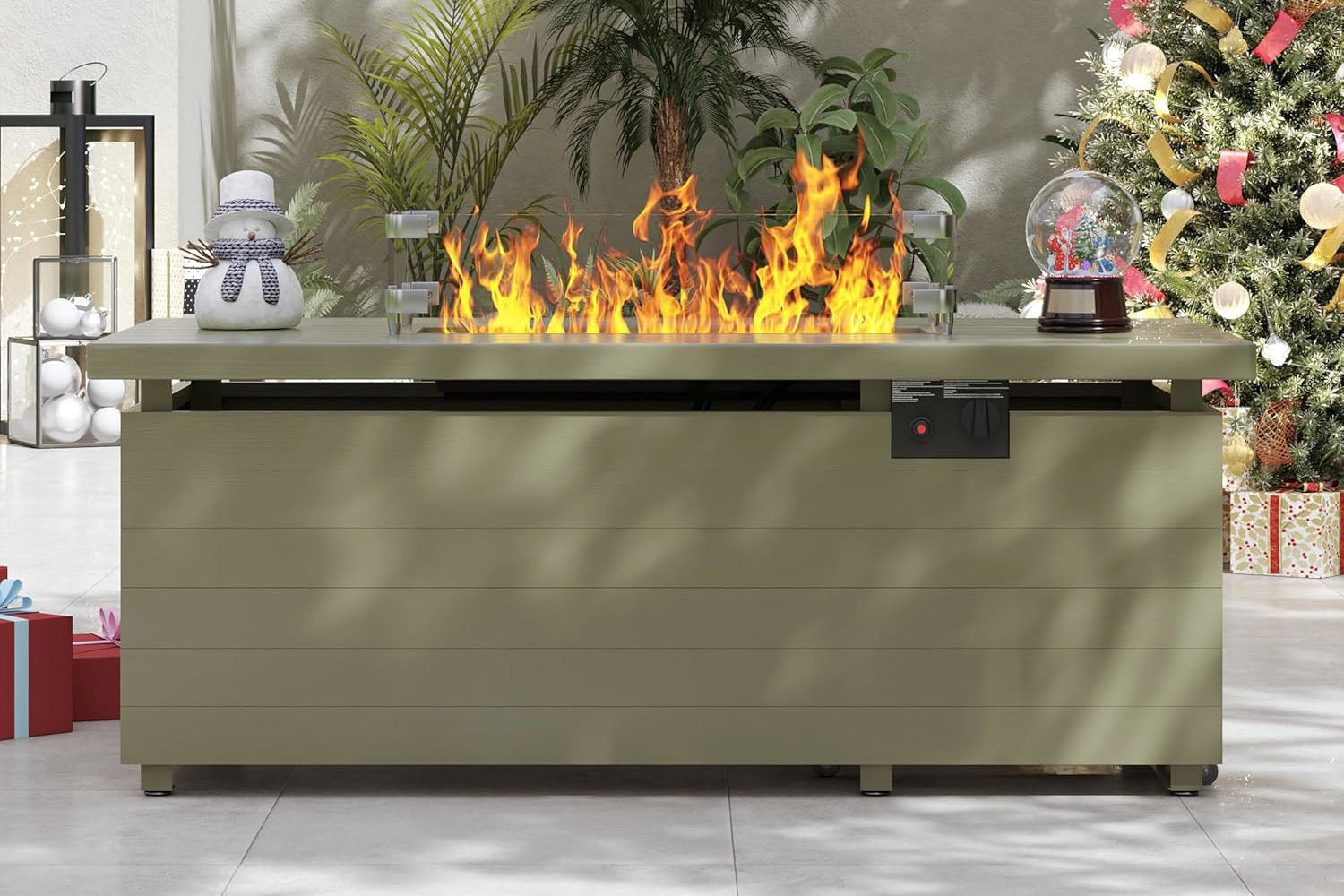Modern fireplace with flames in a room decorated for Christmas.#color_green