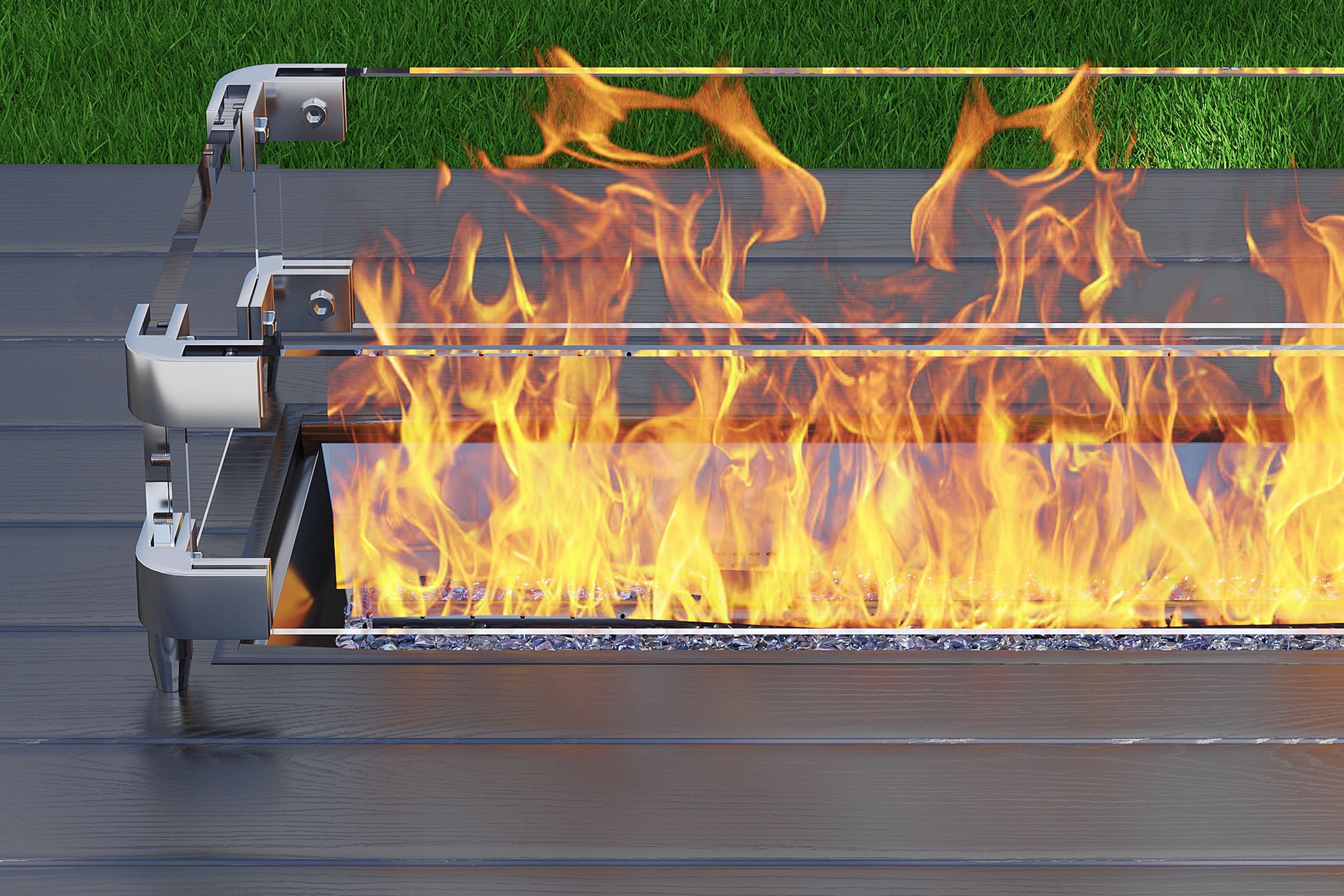 Outdoor fire pit with flames on a grassy background