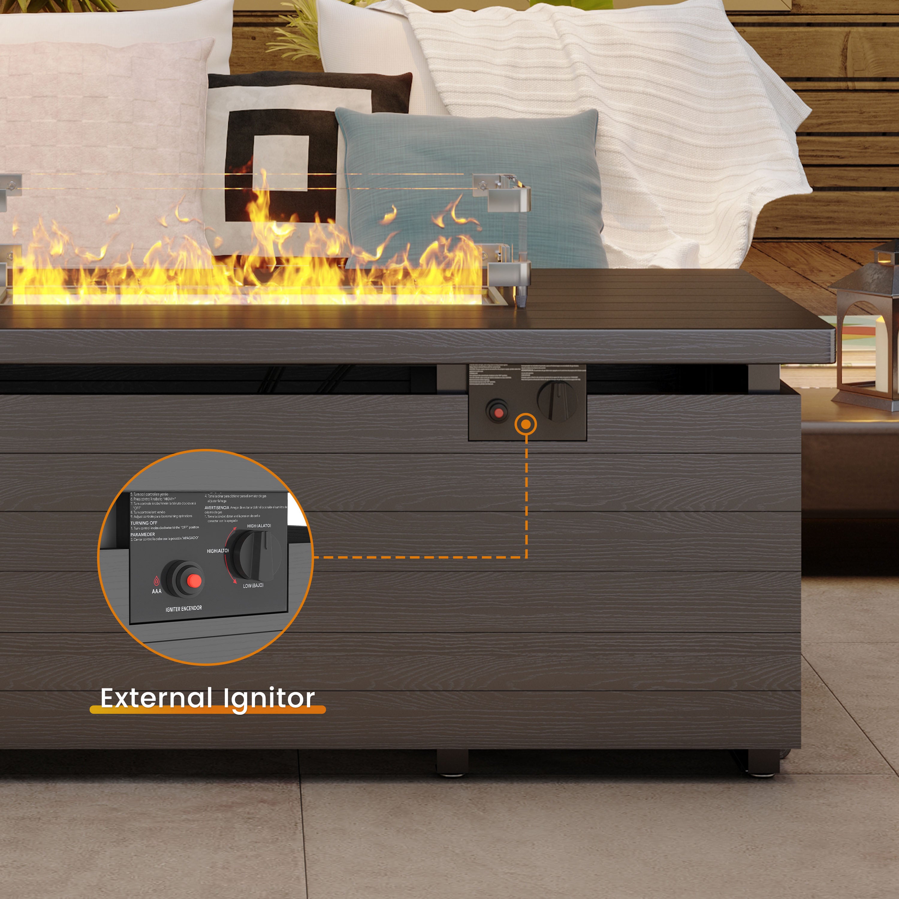 Outdoor fire pit table with flames and external ignitor feature highlighted