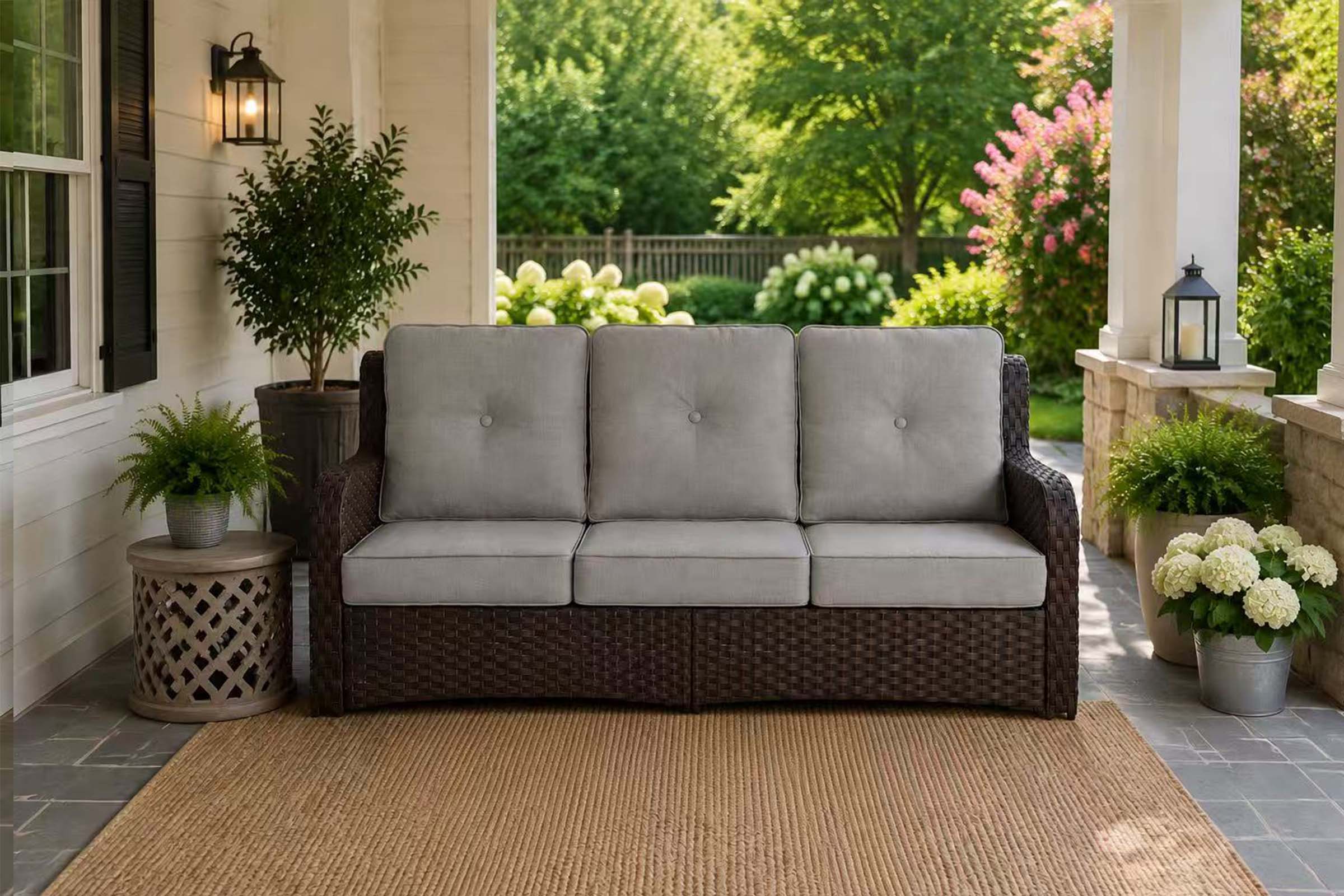3-Seat_Patio_Wicker_Sofa on the patio.#color_gray