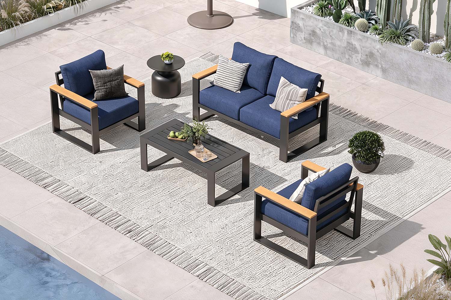 Outdoor furniture set with blue cushions on a patio.#color_deep navy