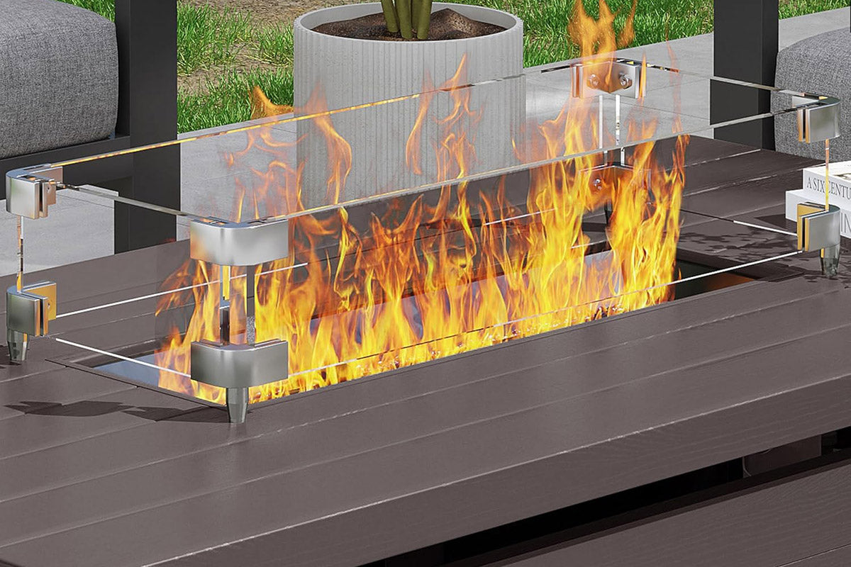 Outdoor fire pit with flames in a garden setting.#color_brown