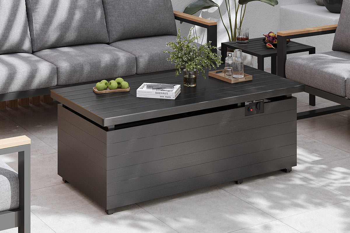 Outdoor coffee table with storage compartment in a patio setting.#color_gray