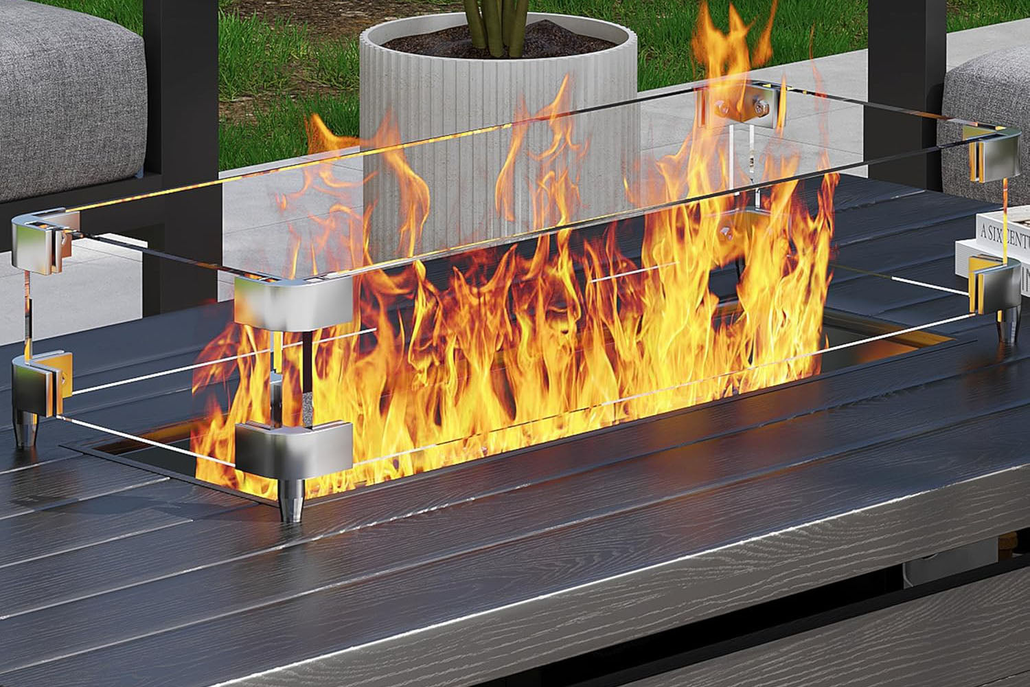 Outdoor fire pit with flames on a wooden deck.#color_gray