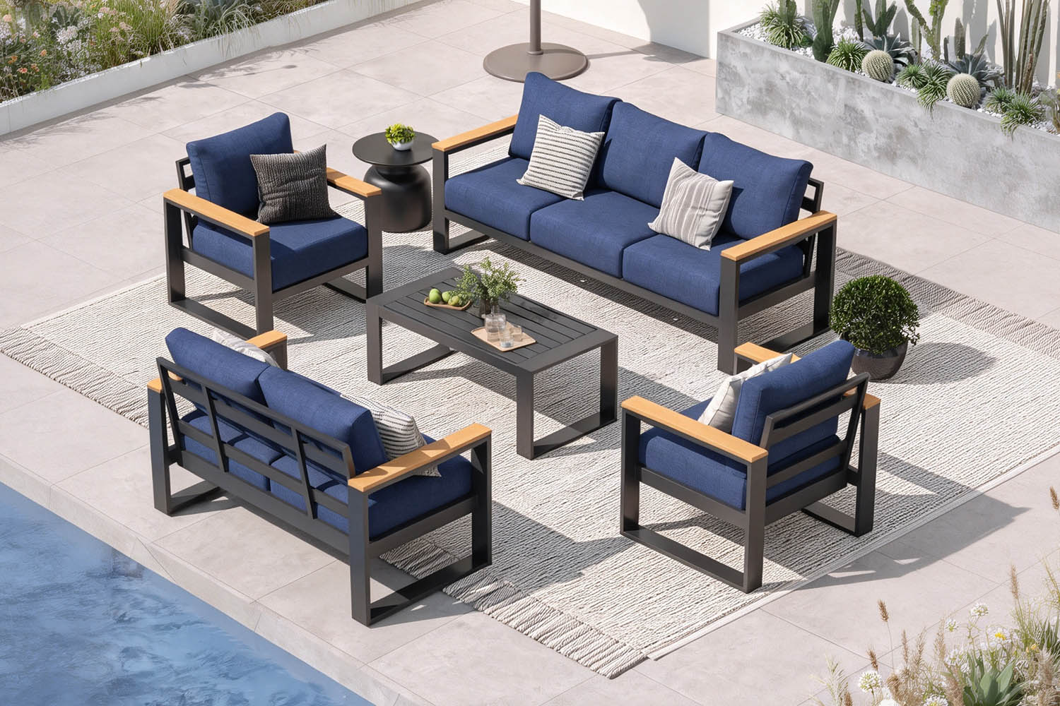 Outdoor patio furniture set with blue cushions on a patio area.#color_deep navy
