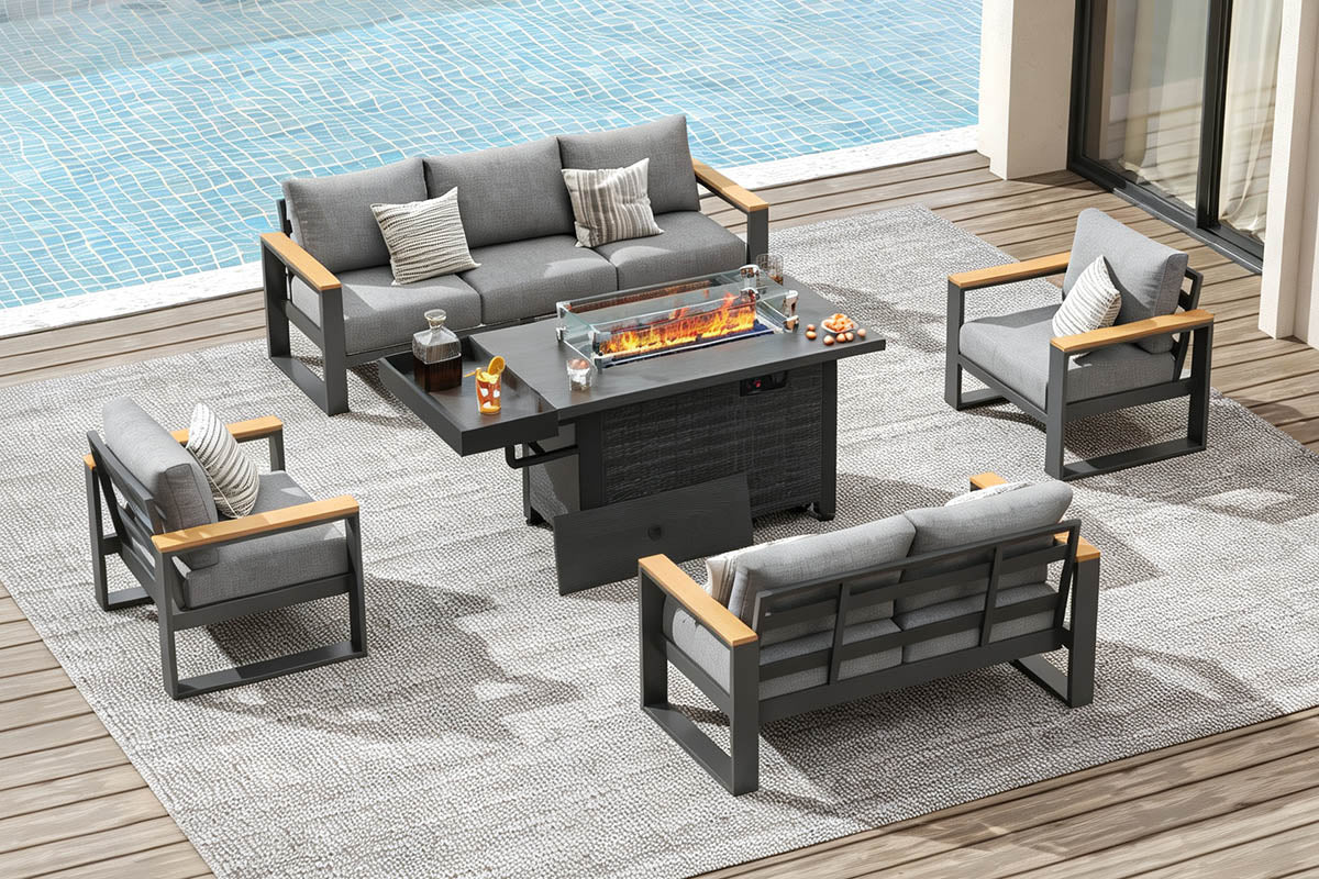 Outdoor patio furniture set with fire pit table by a pool.#color_light gray