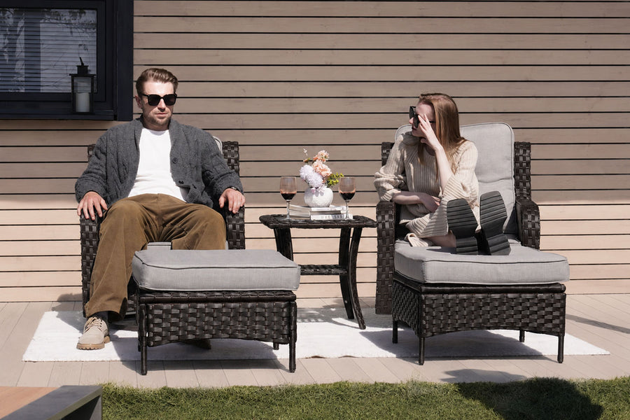 A couple sitting in the Swivel Chairs 