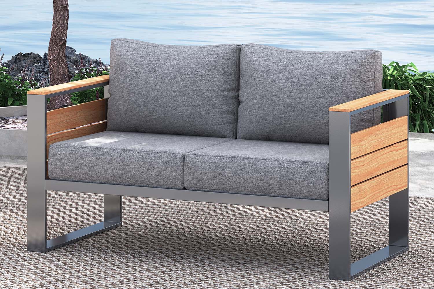 Gray outdoor sofa with wooden grain armrests on a patio with ocean view.#color_gray